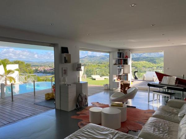 Villa with sea view pool and 3 ilets golf course, Les Trois-Îlets