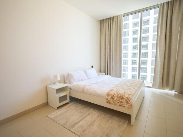 Foto 7: IBIA Homes - Cozy 2BR Holiday Retreat