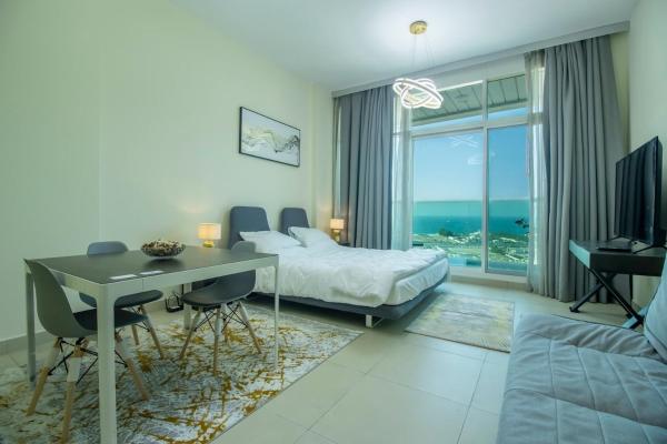 A la foto es mostra l'objecte Hilliana Tower - Cozy Studio with Sea View situat a la ciutat de Dubai.