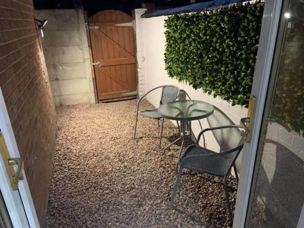 På bildet vises objektet Cosy Home in Newton-Le-Willows som ligger i byen Earlestown.