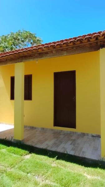 The photo shows the Casa em Cumuruxatiba located in the city of Prado.