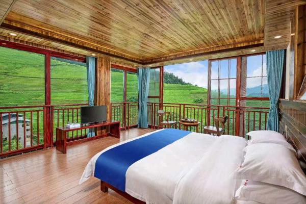 Στη φωτογραφία φαίνεται το αντικείμενο Longji Forest Lodge που βρίσκεται στην πόλη Heping.