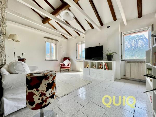 A la foto es mostra l'objecte Caligaggio 18 - Charming apartment on the lakefront situat a la ciutat de Malgrate.