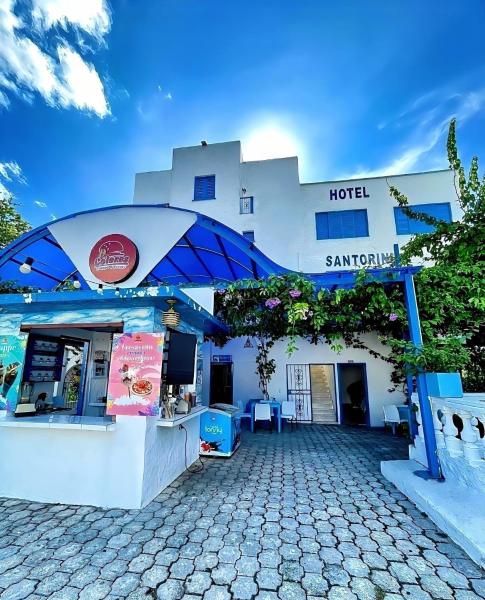 Nella foto è visibile l'oggetto Hotel Santorini Aldea Doradal situato nella città di Puerto Triunfo.