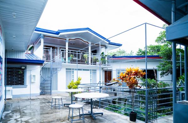 På billedet ses objektet RedDoorz at Lao Singuan Homestay beliggende i byen Del Carmen.