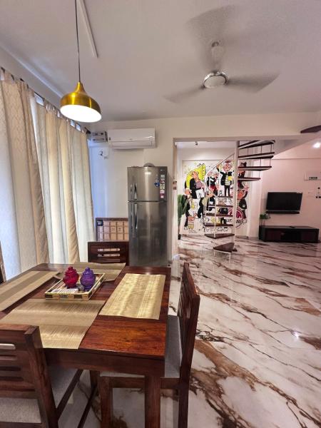 The photo shows the Abode 3-2 bhk attic private terrace Siolim Marna located in the city of Naozor.