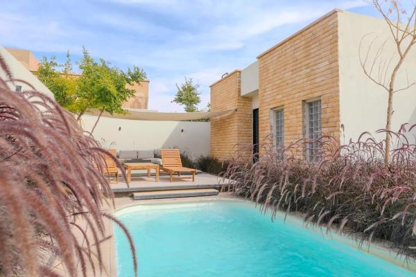 A la foto es mostra l'objecte Portal Chalets With Private Pool - Al-Rawda situat a la ciutat de Riad.