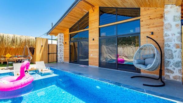 A la foto es mostra l'objecte Saribelen Village Luxury Villa - 9805 situat a la ciutat de Kalkan.