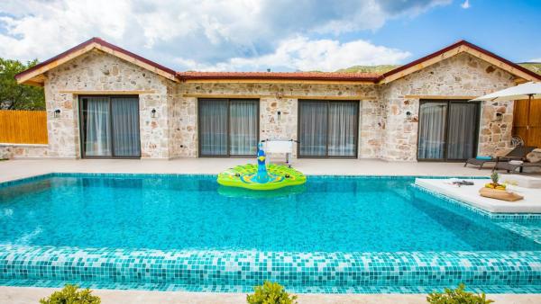 A la foto es mostra l'objecte Saribelen Village 2 Bedroom Villa - 2360 situat a la ciutat de Kalkan.