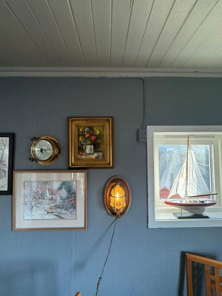 A la foto es mostra l'objecte The Fishermans Wharf situat a la ciutat de Hellesøy.