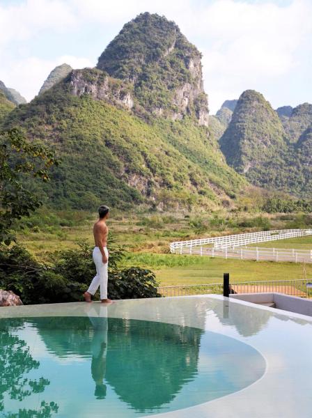 A la foto es mostra l'objecte Yangshuo One Thousand and One Courtyard Views B&B situat a la ciutat de Yangshuo.