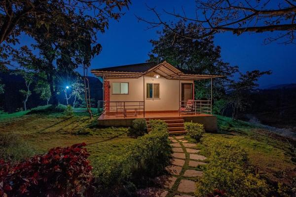 A la foto es mostra l'objecte CosmicStays Lazy River Cottage-Stargazers Paradise situat a la ciutat de Pāsali.