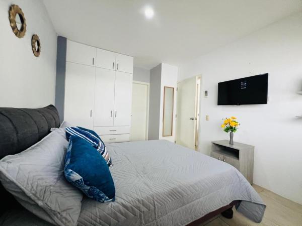 A la foto es mostra l'objecte Relajate en Manta, habitacion y piscina situat a la ciutat de Manta.