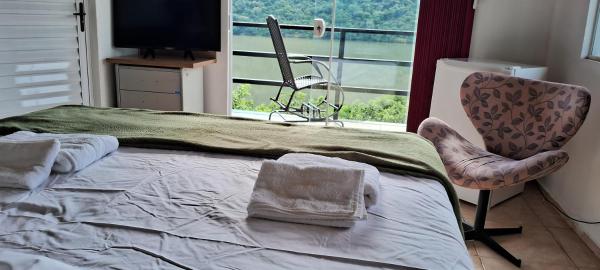 A la foto es mostra l'objecte Casa c1 piscina goioen situat a la ciutat de Nonoai.