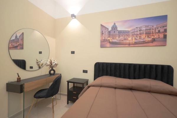 Na foto é possível ver o objeto luxury apartment localizado na cidade de Palermo.