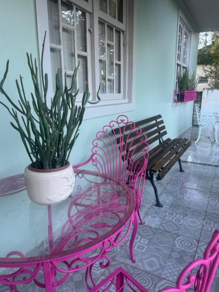 Στη φωτογραφία φαίνεται το αντικείμενο Casa da Praça Hospedaria που βρίσκεται στην πόλη Tibagi.