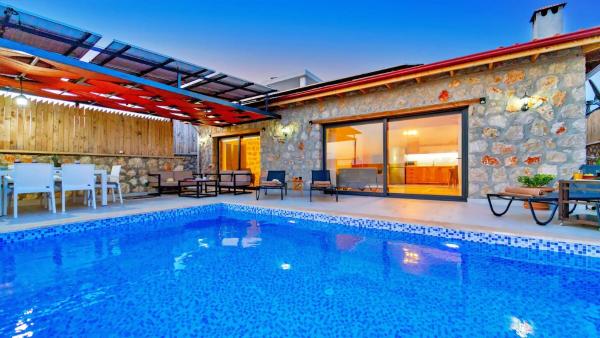 The photo shows the Patara 1 Bedroom Villa 4361 located in the city of Adakoy.