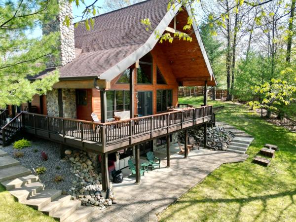 The photo shows the Dog friendly, lakefront home perfect for families located in the city of Eagle River.