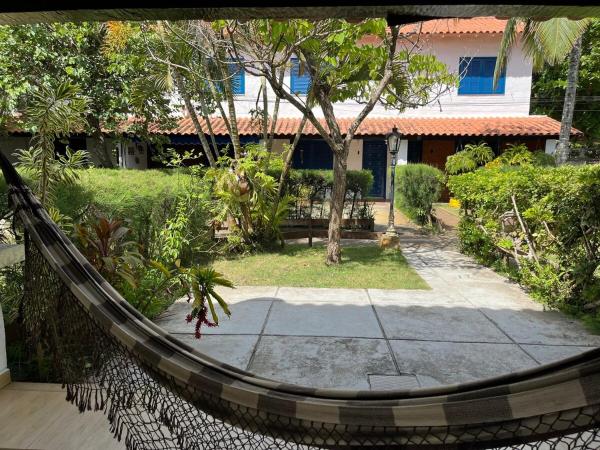 A la foto es mostra l'objecte Linda Casa na Praia do PERÓ - CABO FRIO situat a la ciutat de Peró.