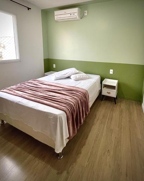 A la foto es mostra l'objecte Ap de 2 quartos com AR, wifi e garagem - Bairro tranquilo situat a la ciutat de Santo Ângelo.
