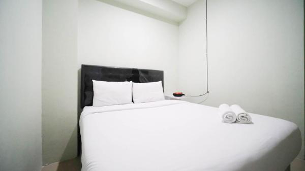 En la foto se muestra el objeto Best Location and Comfy 2BR at Bale Hinggil Apartment By Travelio ubicado en la ciudad de Kedungbaruk.