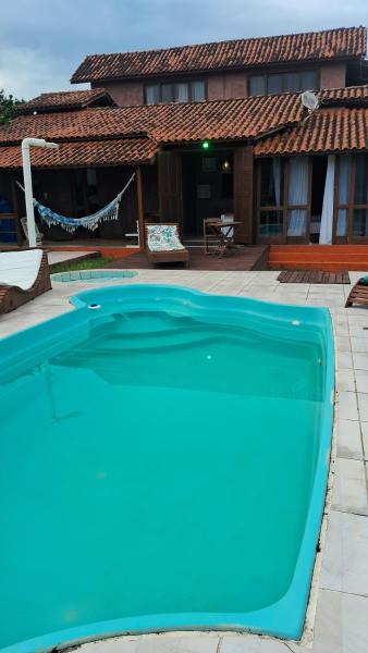A la foto es mostra l'objecte Casa Rosa charme situat a la ciutat de Garopaba.
