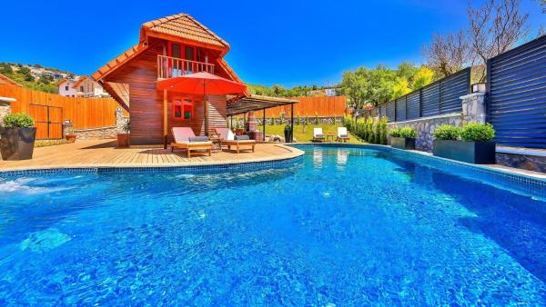 A la foto es mostra l'objecte Saribelen Village 3 Bedroom Villa 7910 situat a la ciutat de Kalkan.