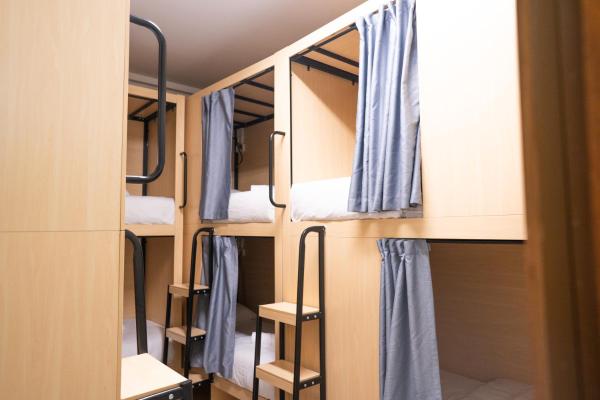 Single Bed in Mixed 12-Beds Dormitory Room — 20 m² - Code Hostel at Kampong Glam
