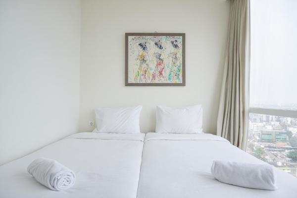 Nice and Elegant 2BR at 26th Floor Menteng Park Apartment By Travelio, Jakarta