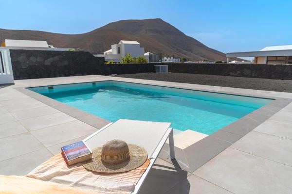 A la foto es mostra l'objecte Vv Villa Secretos de Yaiza 2 by HH - private pool situat a la ciutat de Yaiza.