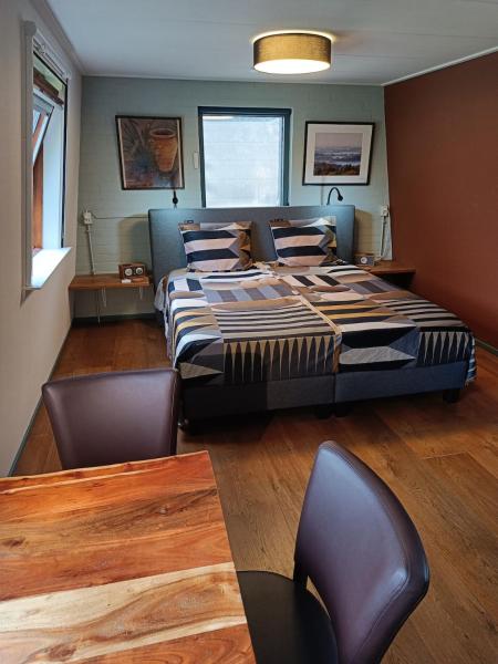 A la foto es mostra l'objecte KNUS tiny gardenhouse situat a la ciutat de Maarn.