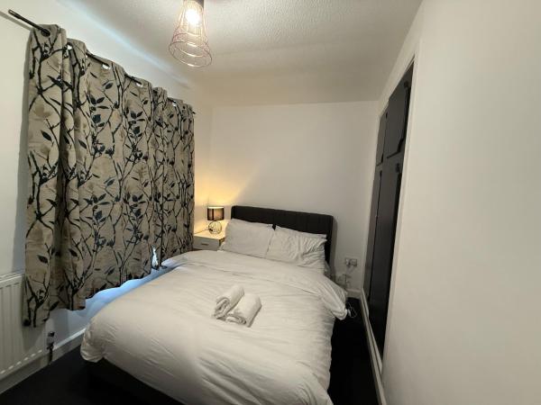A la foto es mostra l'objecte Stunning 4-Bed House in Bridgend situat a la ciutat de Coity.