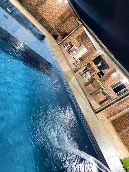 A la foto es mostra l'objecte Casa de campo Refúgio situat a la ciutat de Santa Isabel.