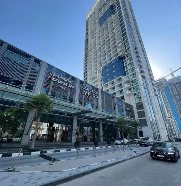 Na fotografii je vidět objekt Damac Maison Prive, Lake View - Free Parking nacházející se ve městě Dubaj.