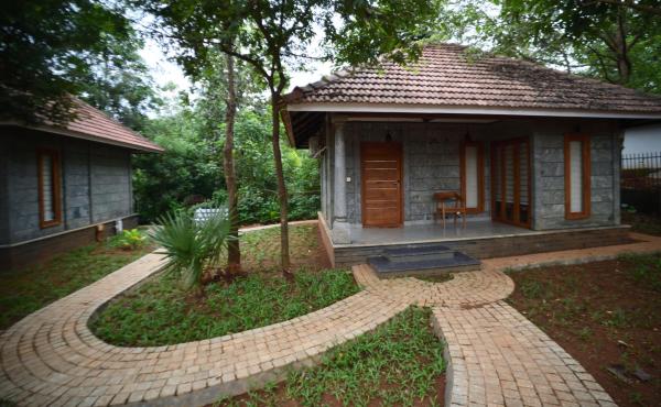 A la foto es mostra l'objecte Hortus Malabaricus Garden Resort situat a la ciutat de Pattāmbi.