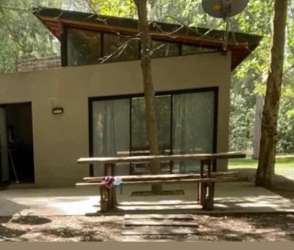 The photo shows the Descanso en el Bosque located in the city of Ángel Etcheverry.