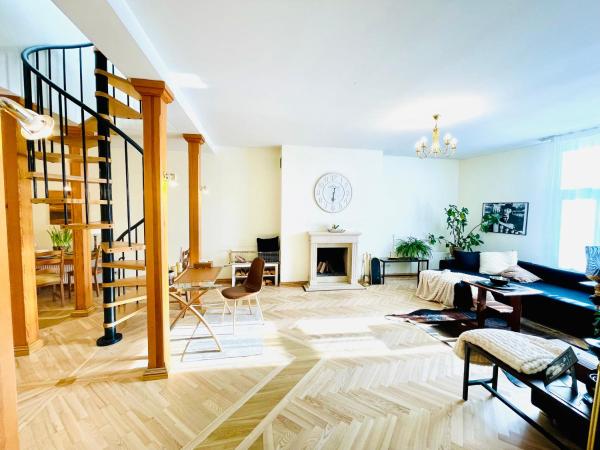 A la foto es mostra l'objecte Penthouse with Private Rooftop situat a la ciutat de Riga.