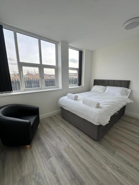 A la foto es mostra l'objecte 2 Bed Sizeable Station House Apartment - Free Wifi, Parking & EV situat a la ciutat de Frodingham.