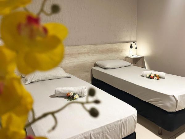 A la foto es mostra l'objecte Lamour Hotel situat a la ciutat de Taguatinga.