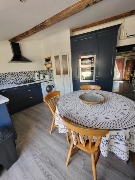 A la foto es mostra l'objecte Duplex en terrasse sur les toits de Provence situat a la ciutat de Sarrians.