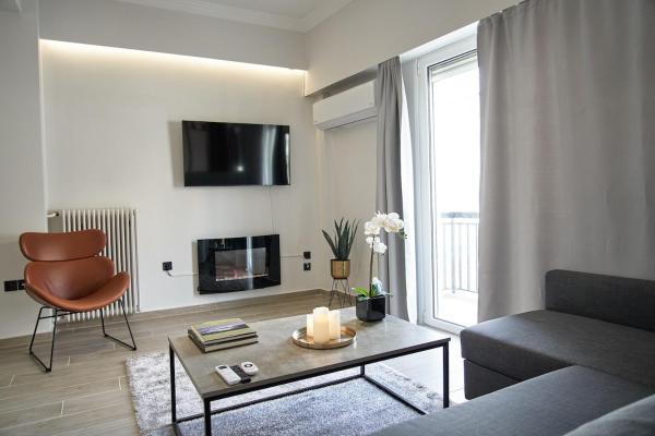 A la foto es mostra l'objecte Cozy Living situat a la ciutat de Patra.