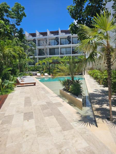 Na zdjęciu widoczny jest obiekt Paraiso en la selva de Tulum położony w mieście Tulum.