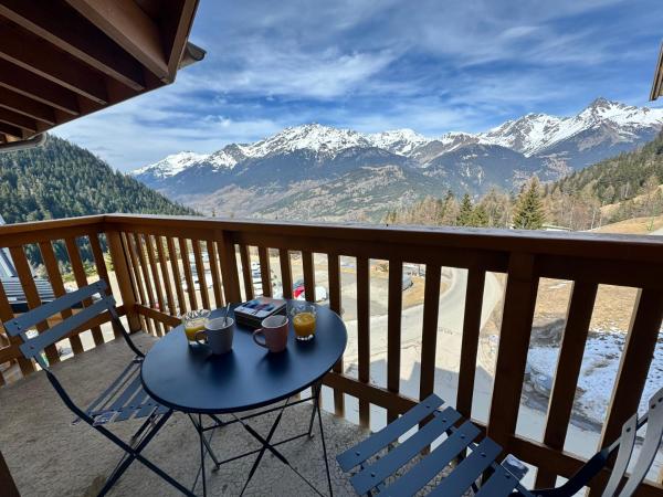 写真にはモダーヌ市にあるAppartement cosy 4 personnes Vue Montagneが写っています。