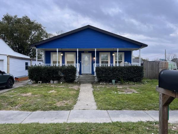 The photo shows the 3 bedroom, 2 bathroom house located in the city of Chalmette.