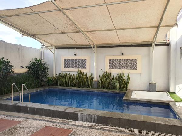 Nella foto è visibile l'oggetto SUNRICH Villa Syariah situato nella città di Batu.