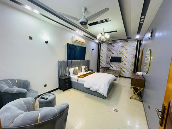 The photo shows the The Family Star Guest House located in the city of Karachi.