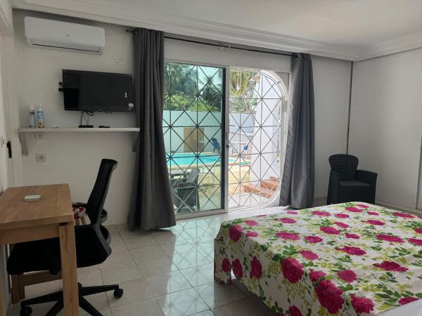 A la foto es mostra l'objecte Maison Mimosa situat a la ciutat de Moosou.