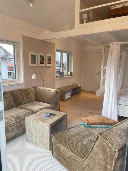 Na fotografii je vidět objekt Fünf Rosen Boutique Apartment - Bio-Ferienwohnung am Staffelsee im Blauen Land nacházející se ve městě Uffing.