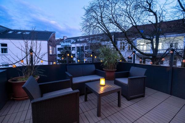 På billedet ses objektet Bismarck Home - Central and Relaxing with Rooftop Terrace in Essen nähe Messe beliggende i byen Essen.