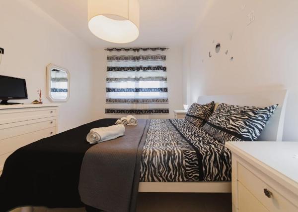 照片显示了位于Macchie市的Swamyhome Aereoportobaripalese物件。